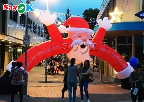 Świąteczna nadmuchiwana brama reklamowa Świąteczny nadmuchiwany łuk Świętego Mikołaja do dekoracji sklepu
